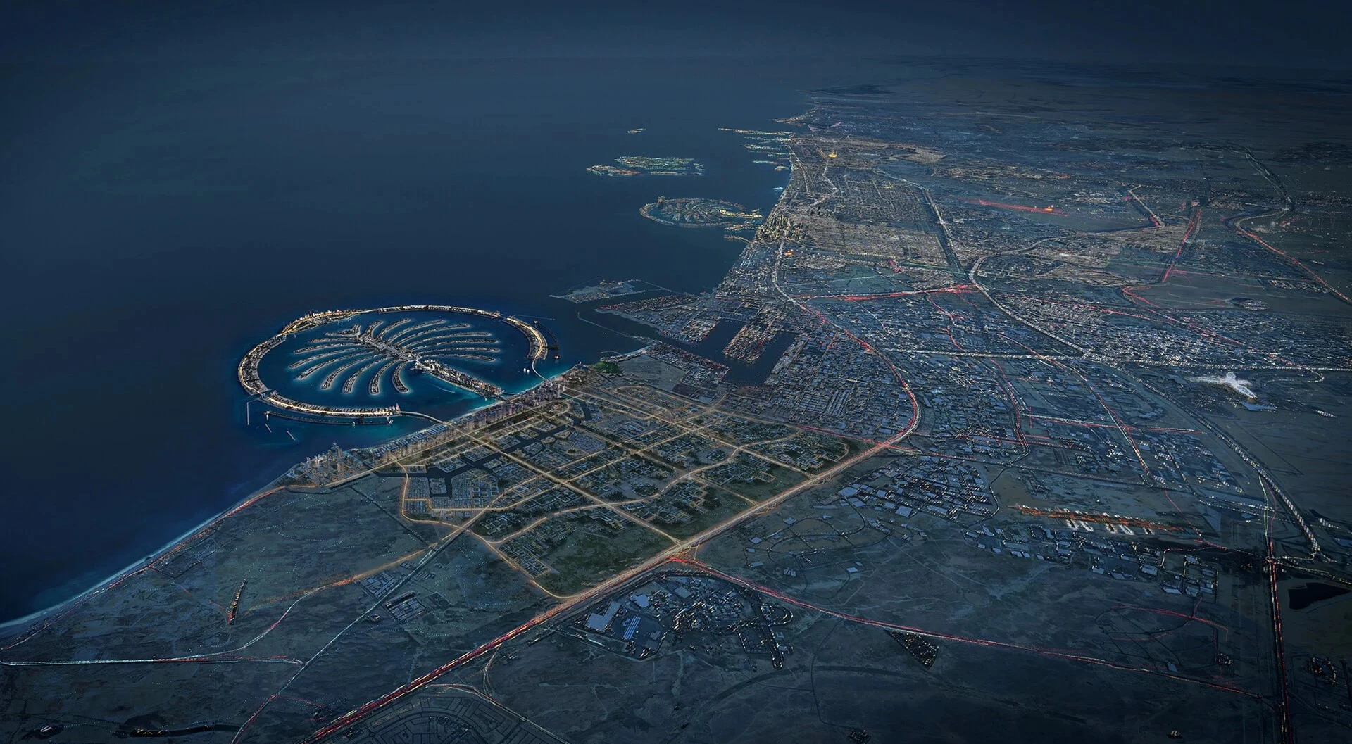 Night aerial showing Palm Jebel Ali in the context of the wider Dubai coastline