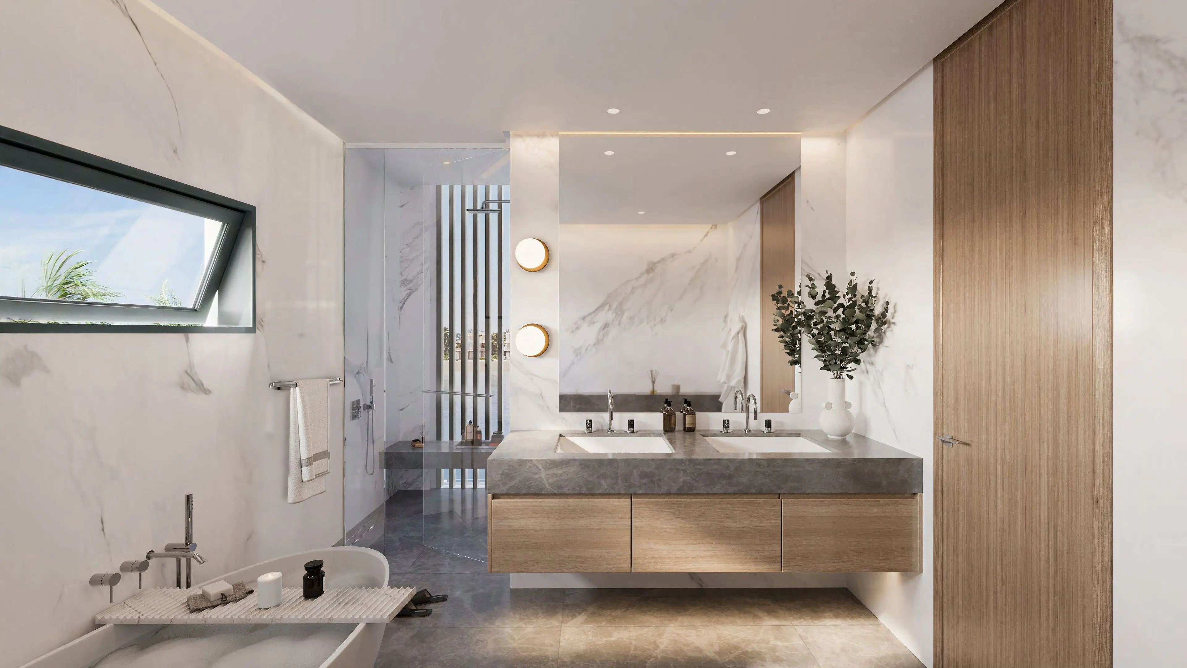 Marble principal bathroom with freestanding bath and twin stone vanity