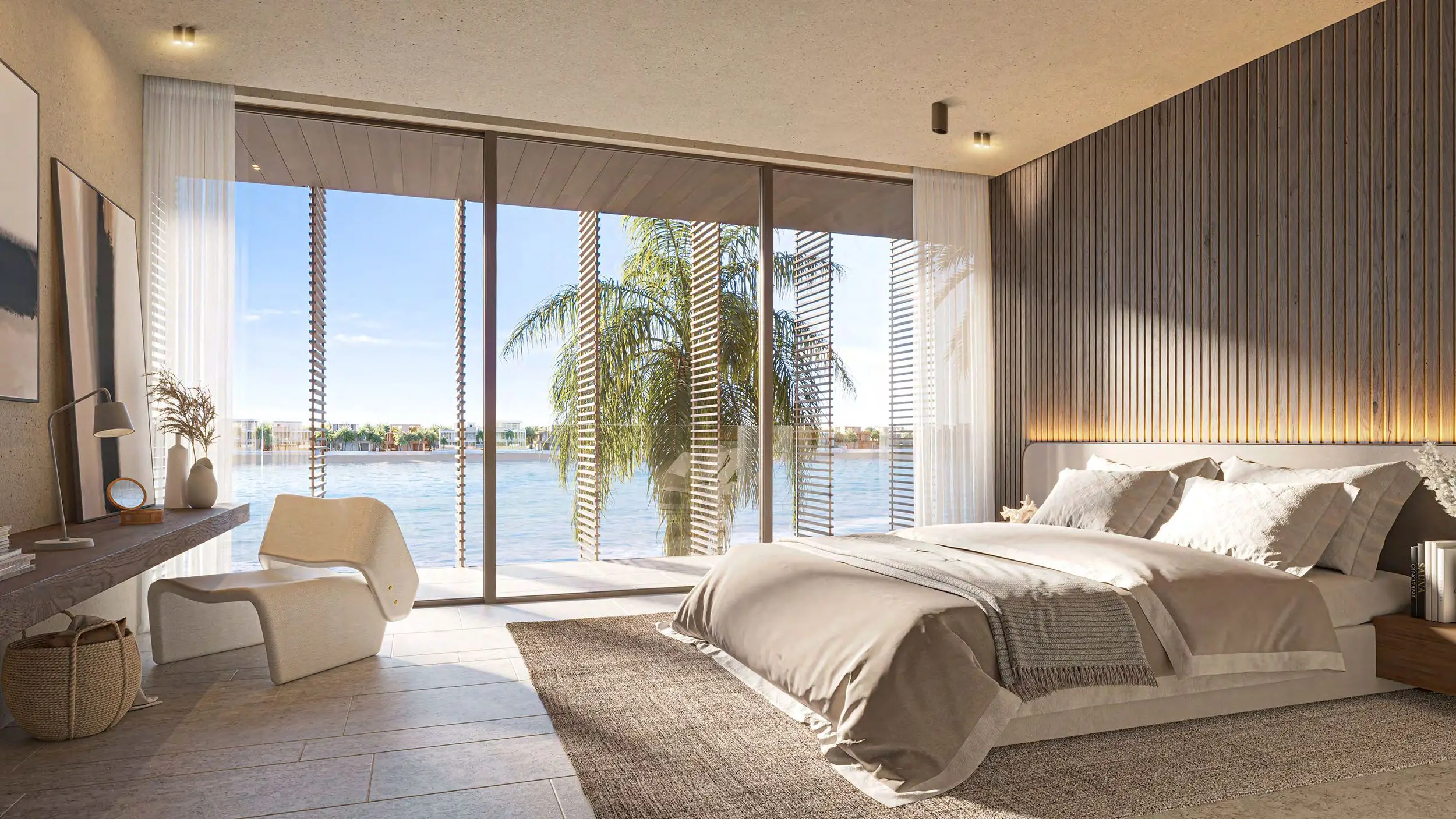 Principal bedroom with full-width glazing onto the water and timber-slatted headboard wall