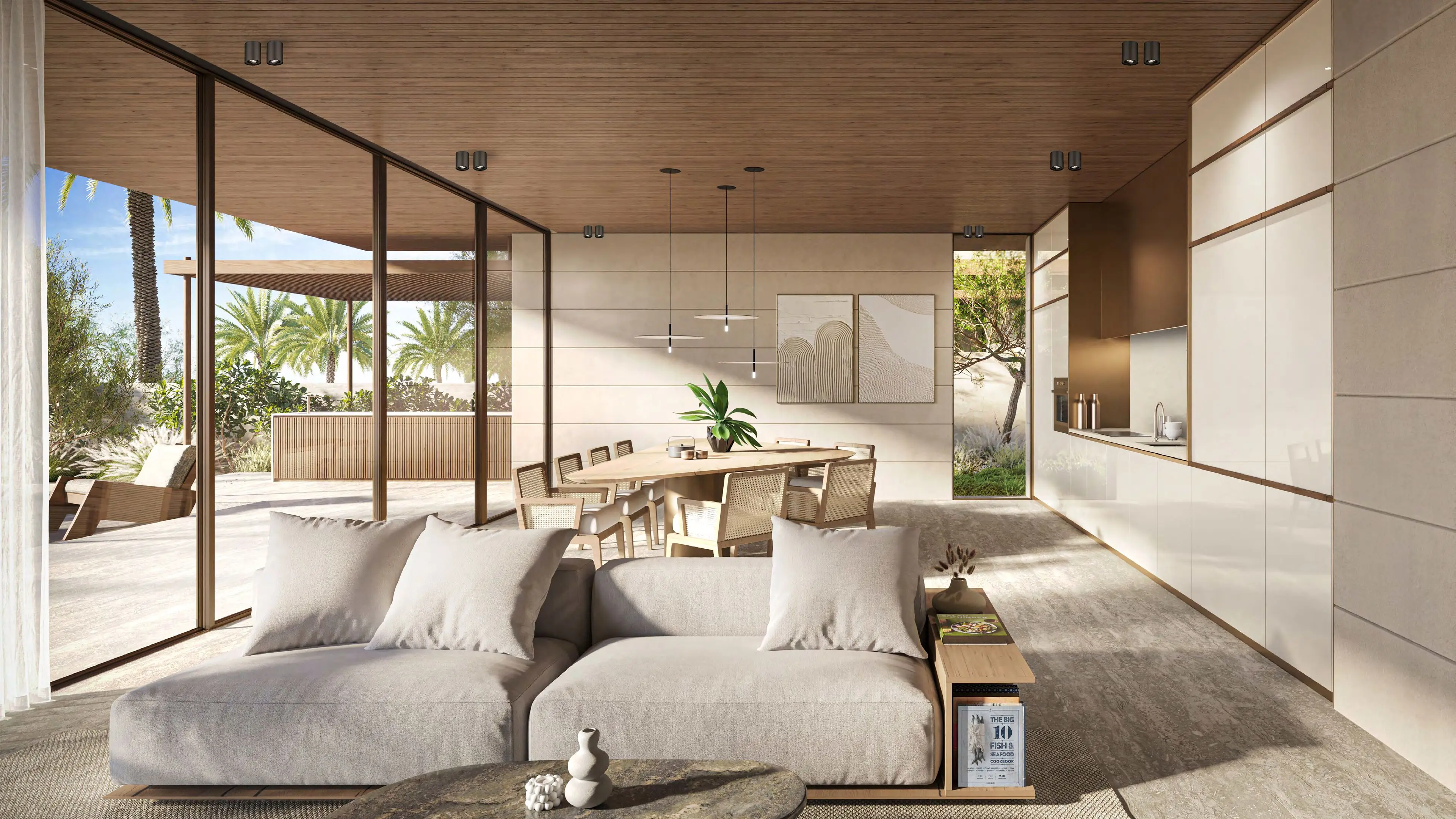 Kitchen and dining area with timber ceiling opening onto a shaded terrace